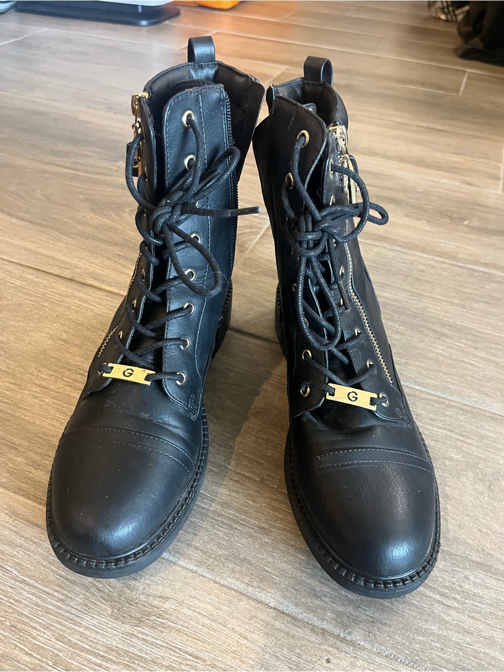 G by Guess Black Lace-Up Leather Combat Boots with Gold Hardware